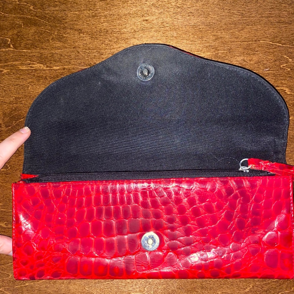 Red snakeskin clutch